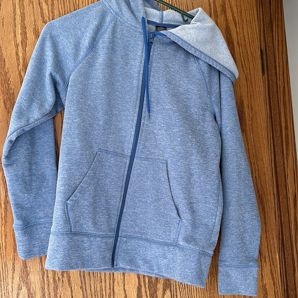 Zip up jacket.